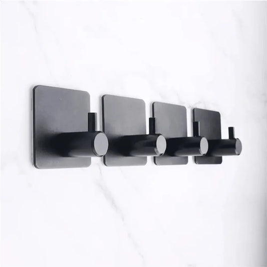 Hoe ver moeten handdoekhaakjes uit elkaar hangen?